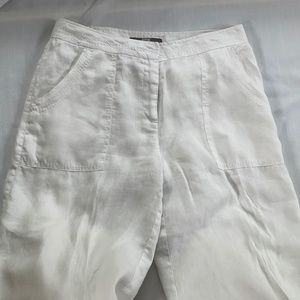 Linen pants with a lining,  two side pockets, and two at the back.